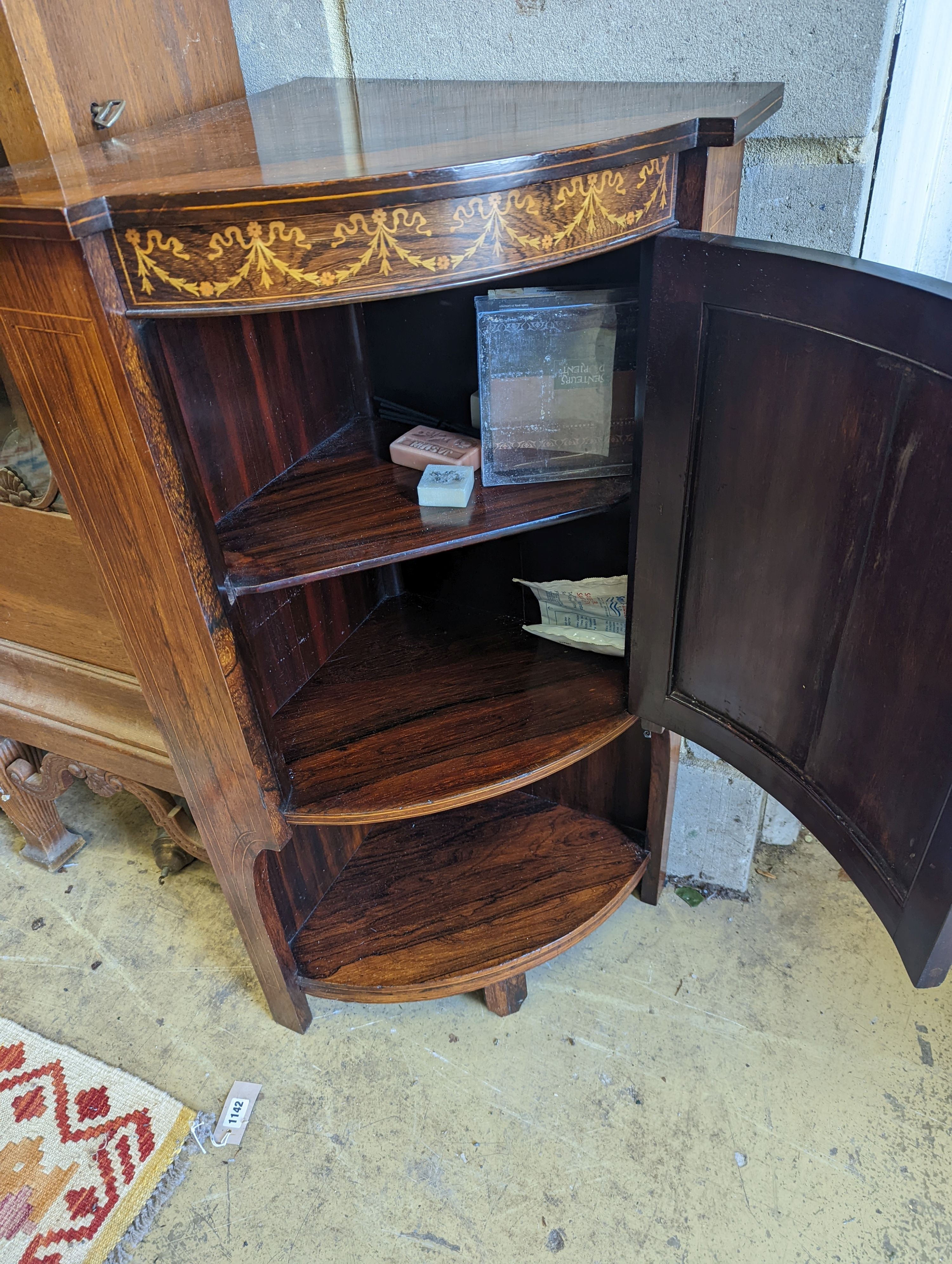 An Edwardian marquetry inlaid rosewood bowfront corner cupboard, width 61cm, depth 43cm, height 97cm
